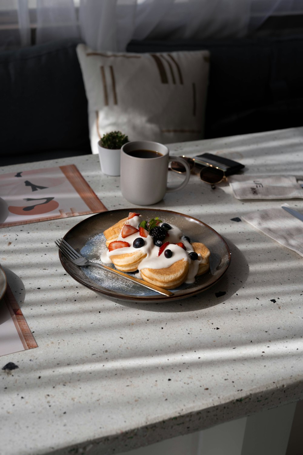 a plate of food sitting on top of a table