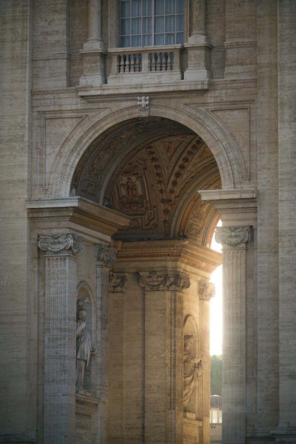 a large stone building with a clock on it's side