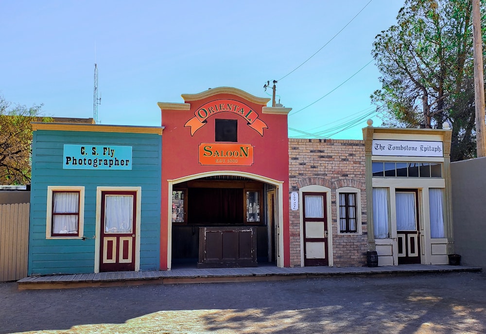 a row of colorful buildings sitting next to each other