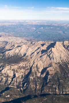 Aerial view of a vast protected area with mountains.