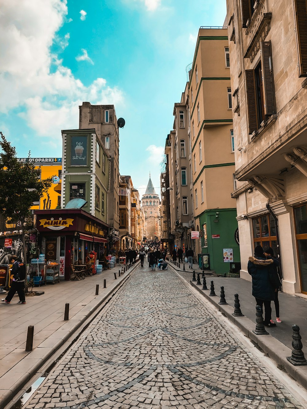 a cobblestone street in a european city