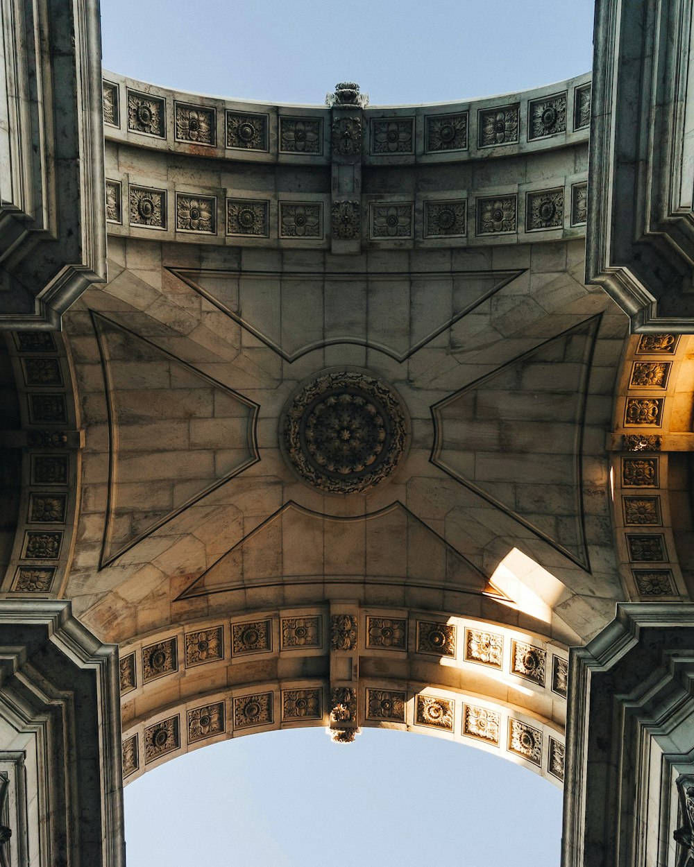 a view of the ceiling of a building from below