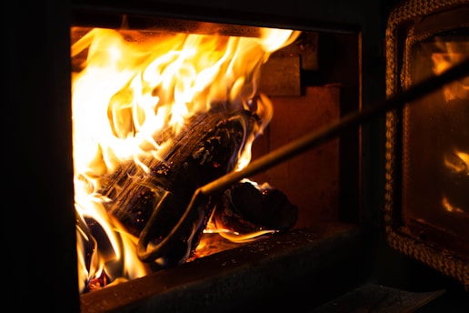 a close up of a fire burning in a stove