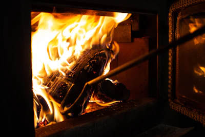 a close up of a fire burning in a stove