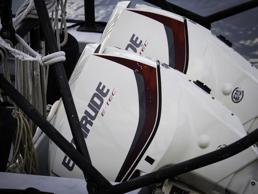 a couple of white boats parked next to each other