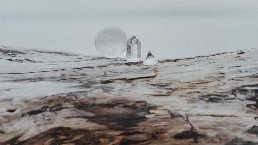 a piece of wood that has some ice on it