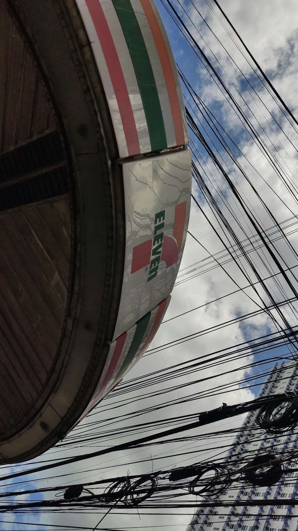 a view of the top of a building from below