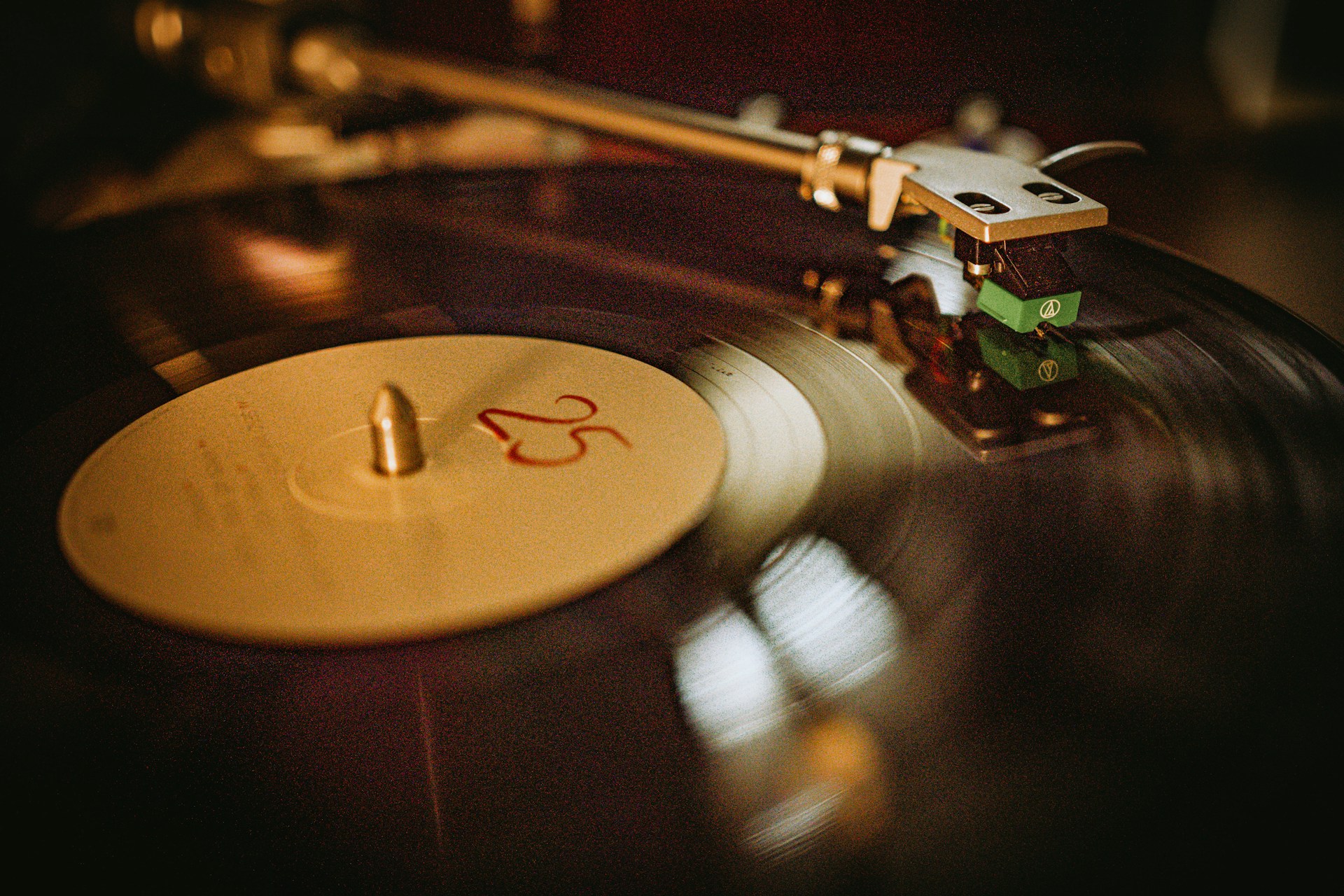 a record player with a flower on top of it