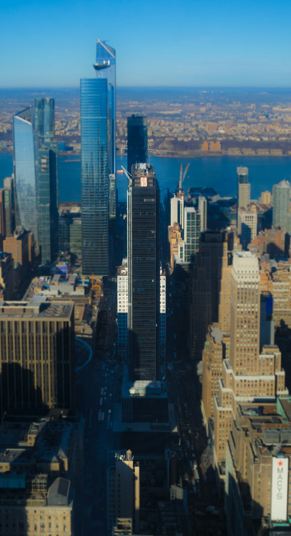 an aerial view of a city with tall buildings