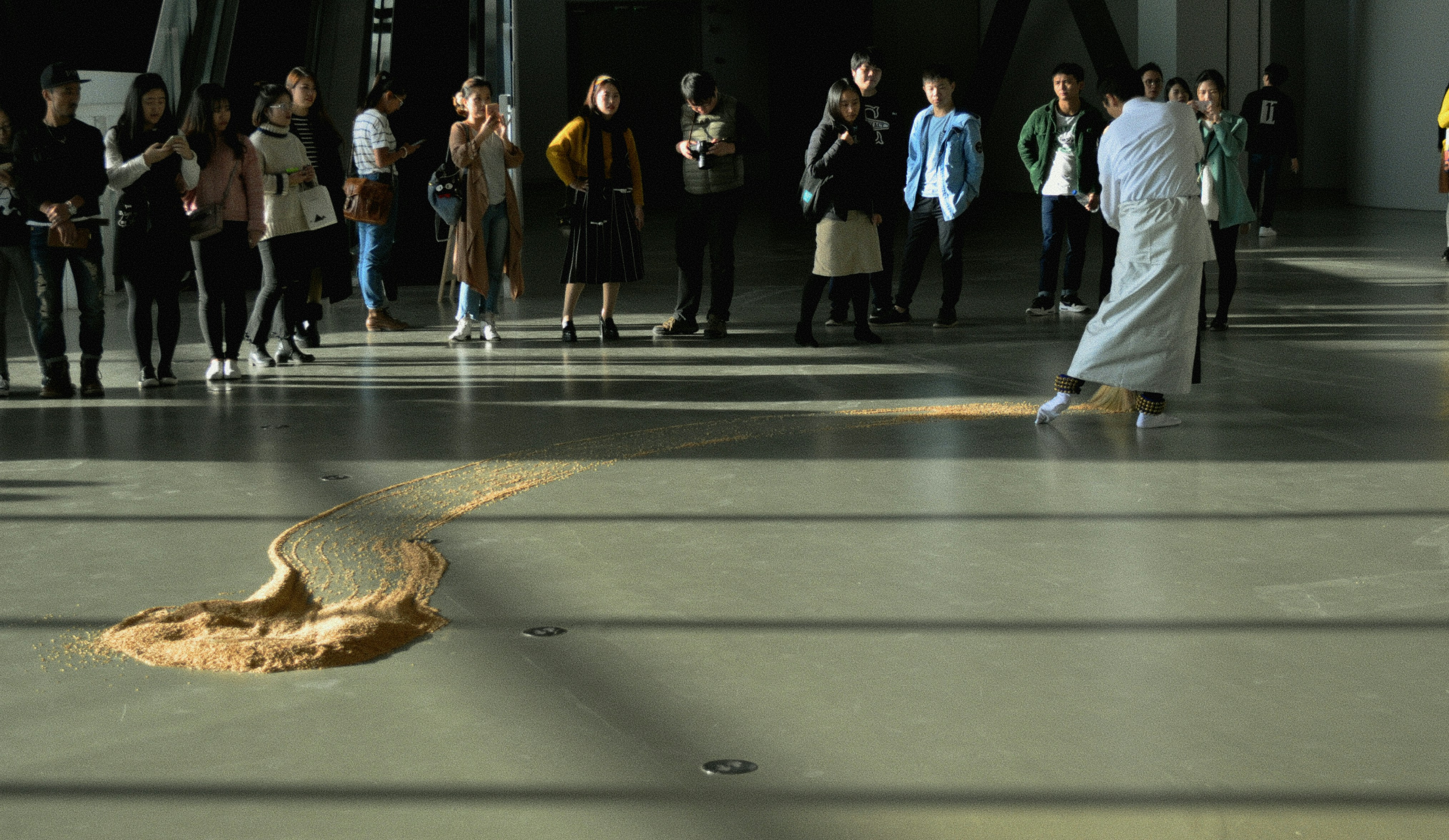 a group of people standing in a room