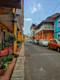 a row of parked cars on a city street