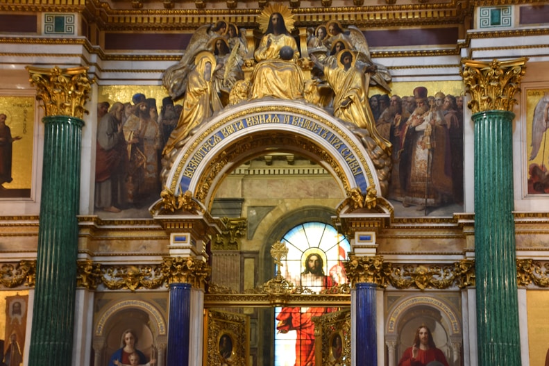 a church with a large painting on the wall