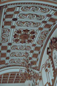 Elegant gypsum ceiling design with subtle gold details in a spacious lounge