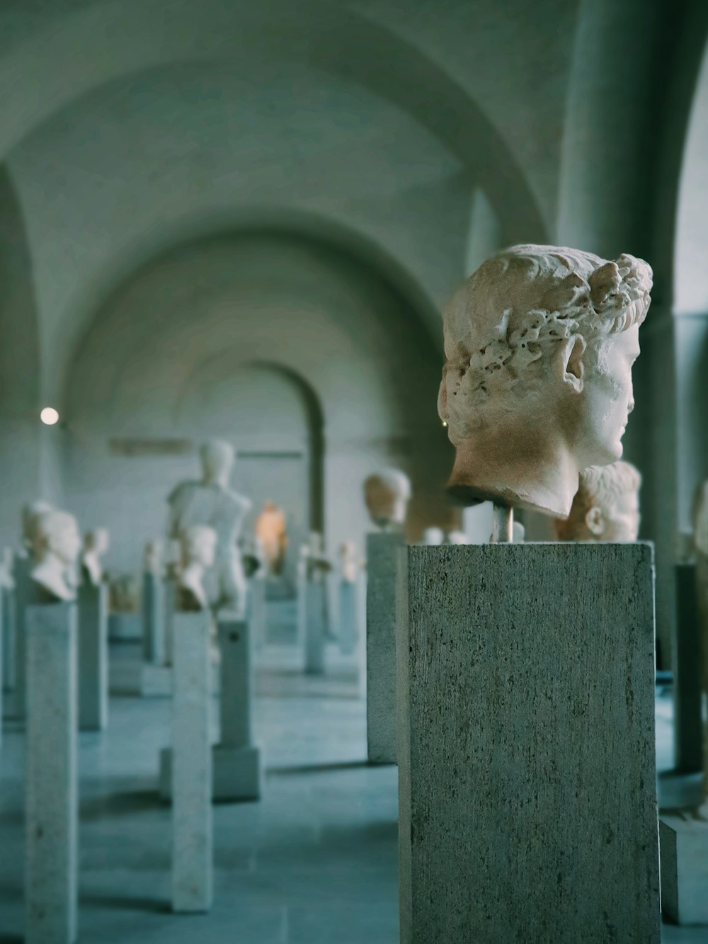 a bunch of statues that are in a room