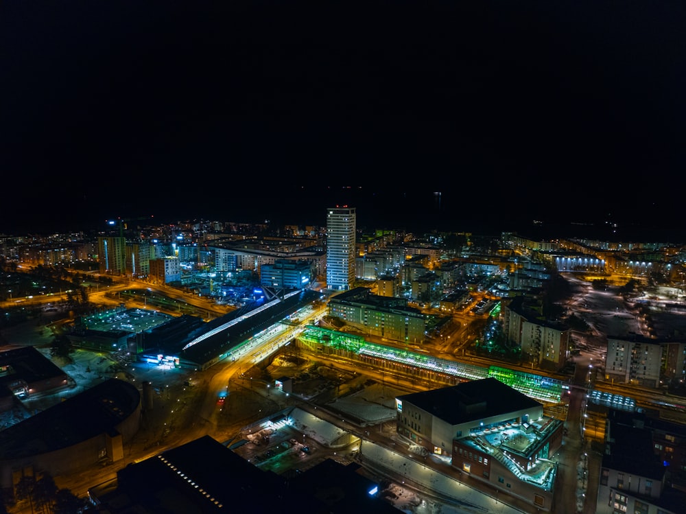 an aerial view of a city at night