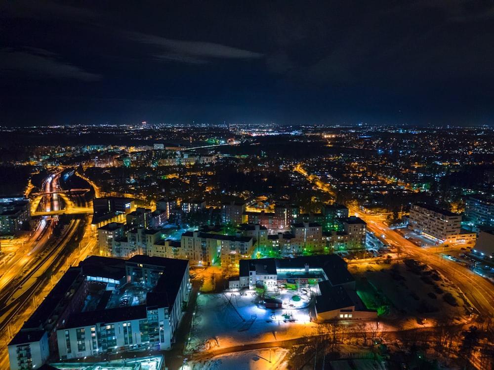 an aerial view of a city at night