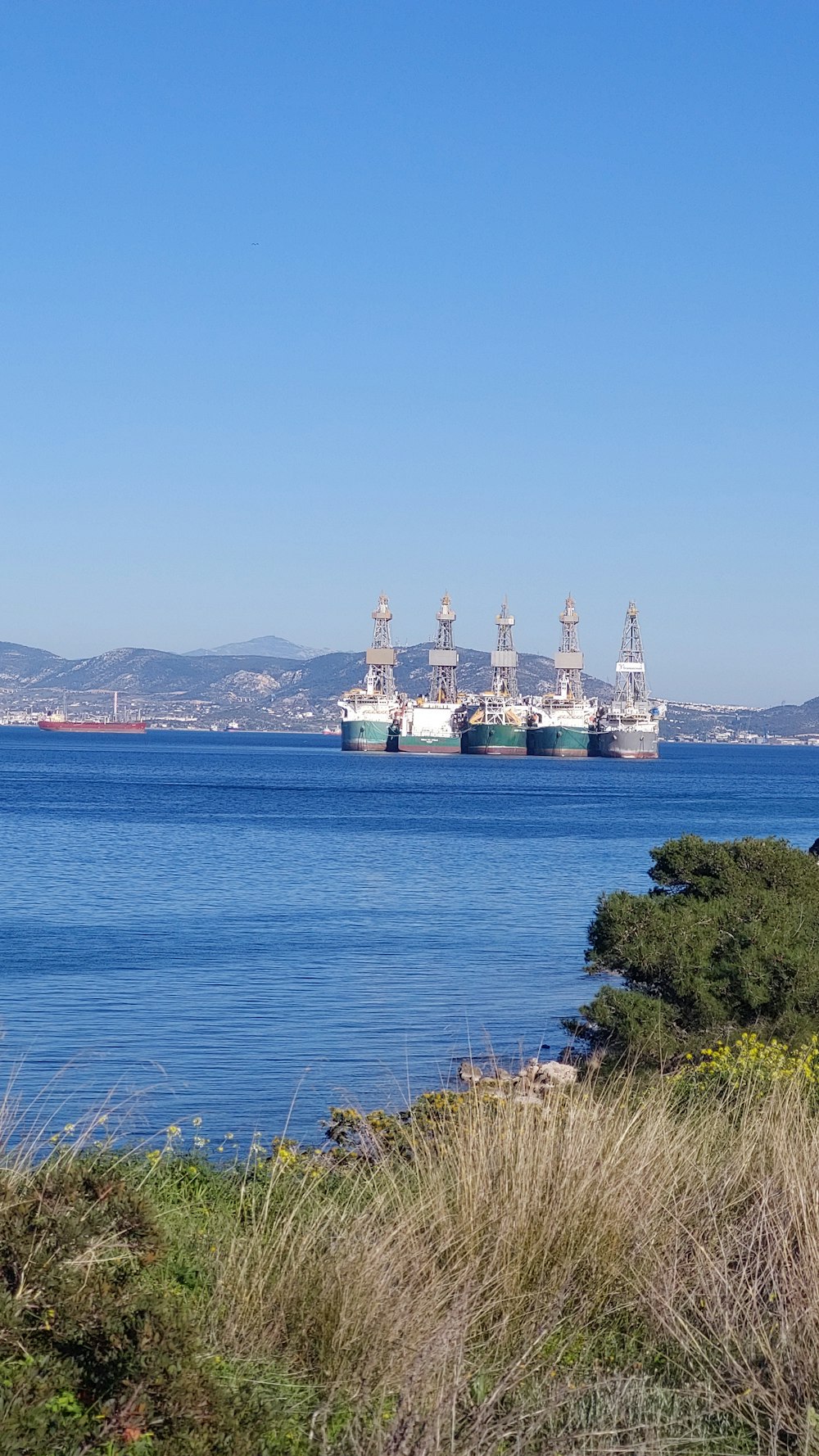 a body of water with a large ship in the distance