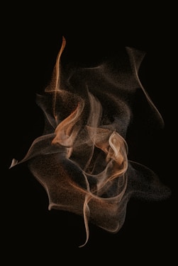 Abstract dark shapes flowing seamlessly, hinting at motion and creativity.
