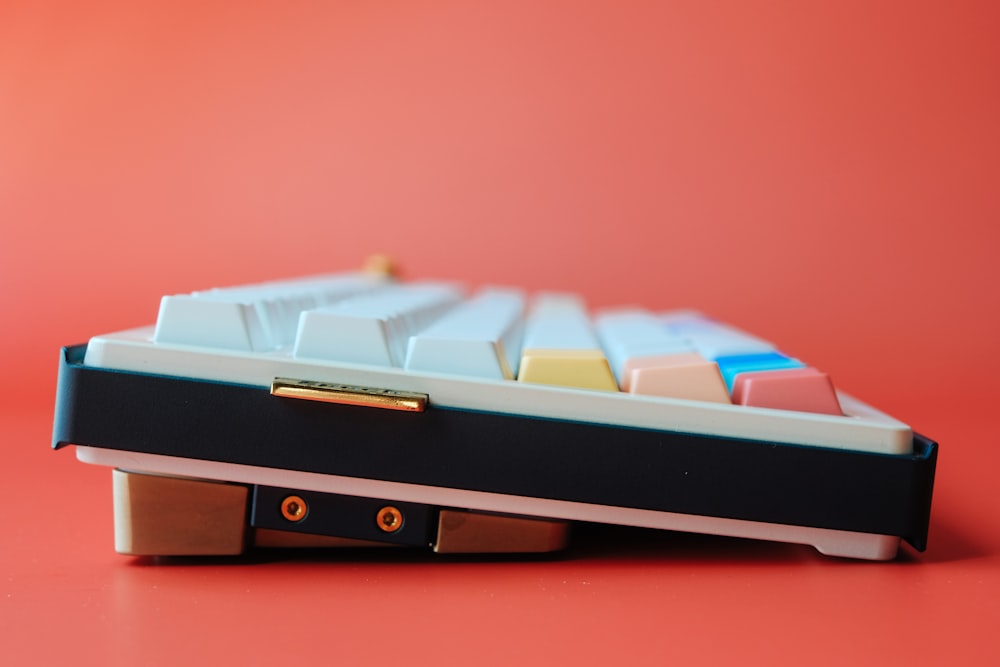 a computer keyboard sitting on top of a table