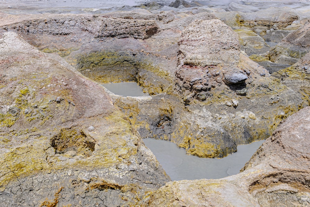 a group of rocks that have some water in them