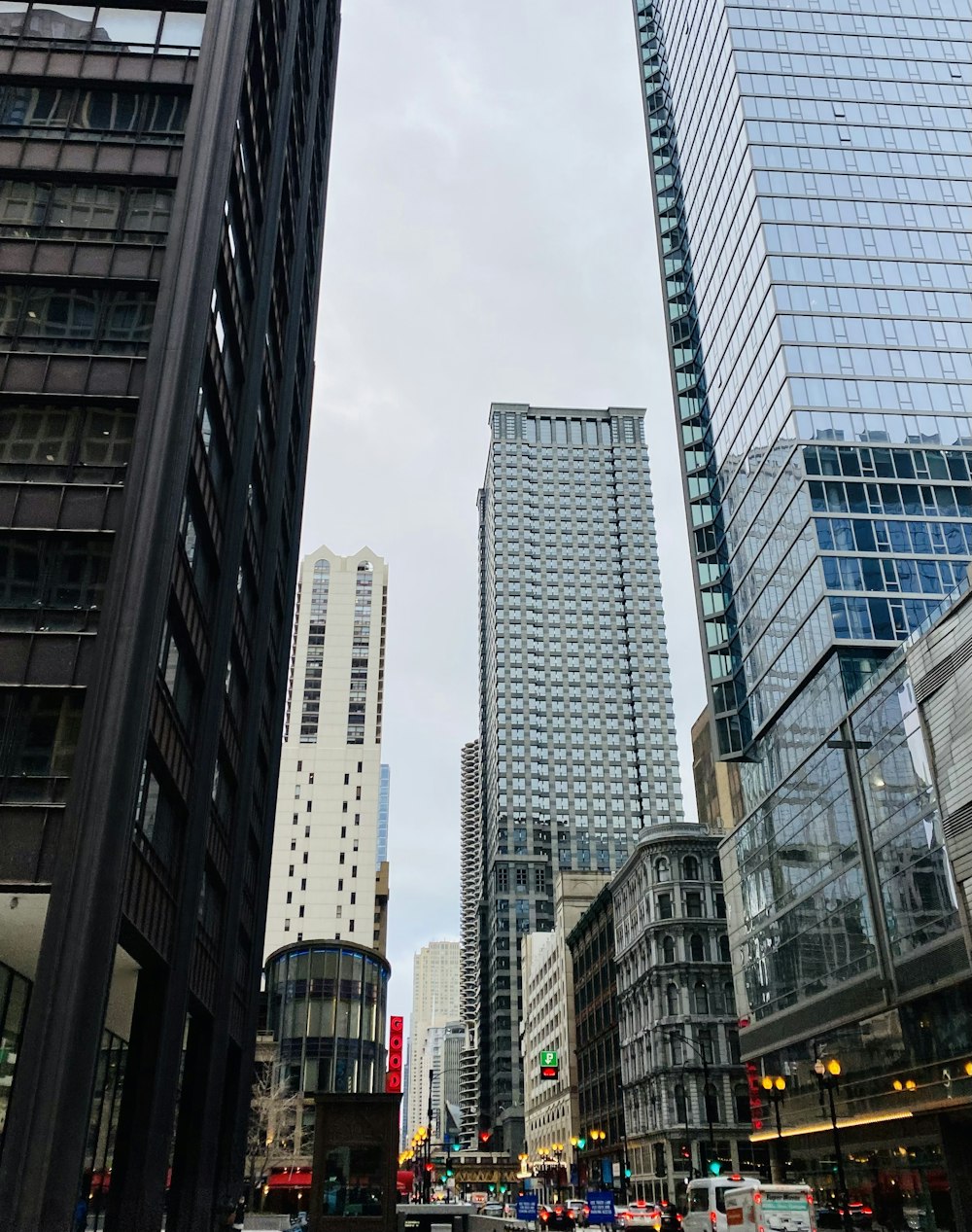 a city street filled with lots of tall buildings