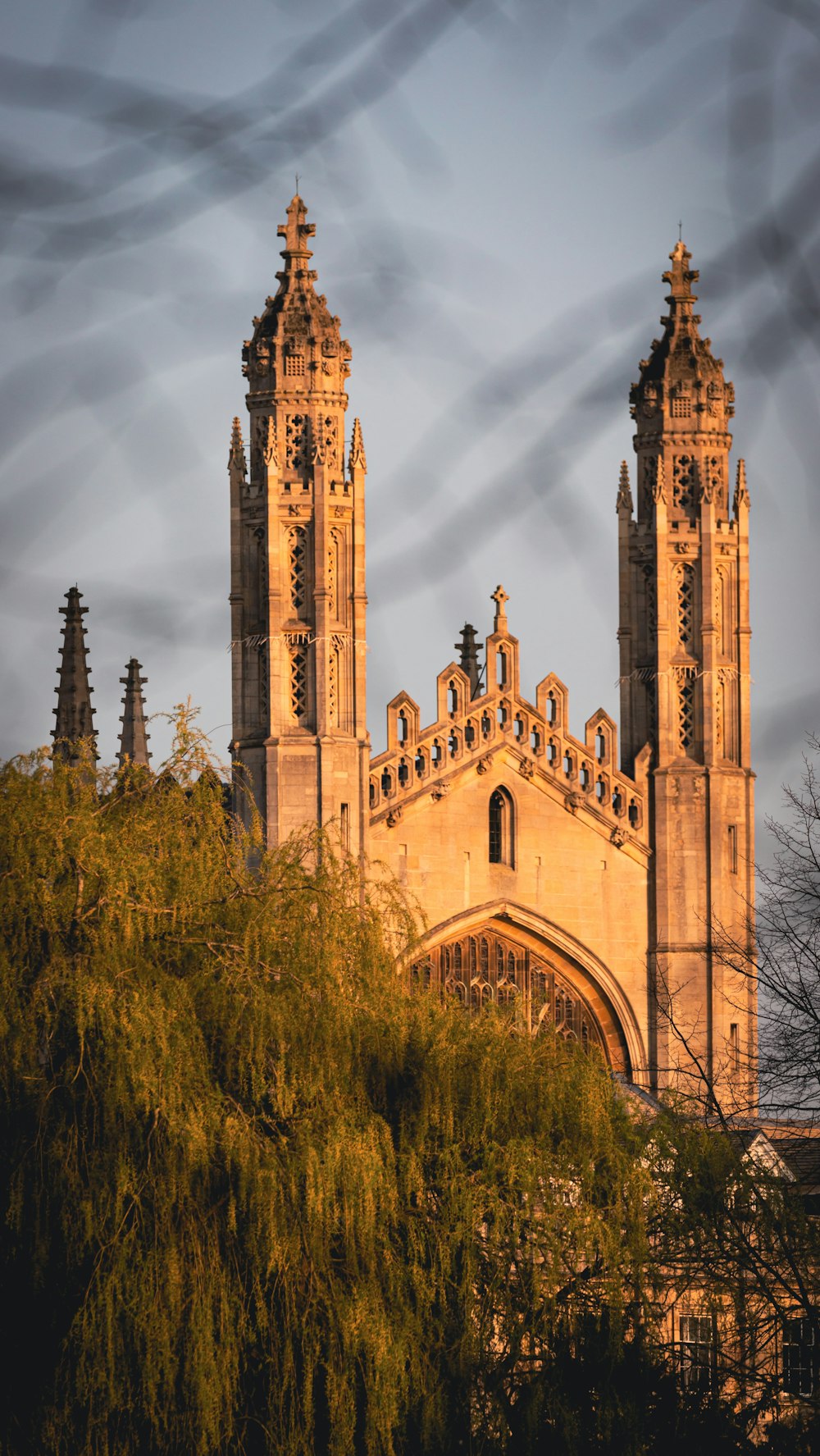 a large building with two towers and a clock