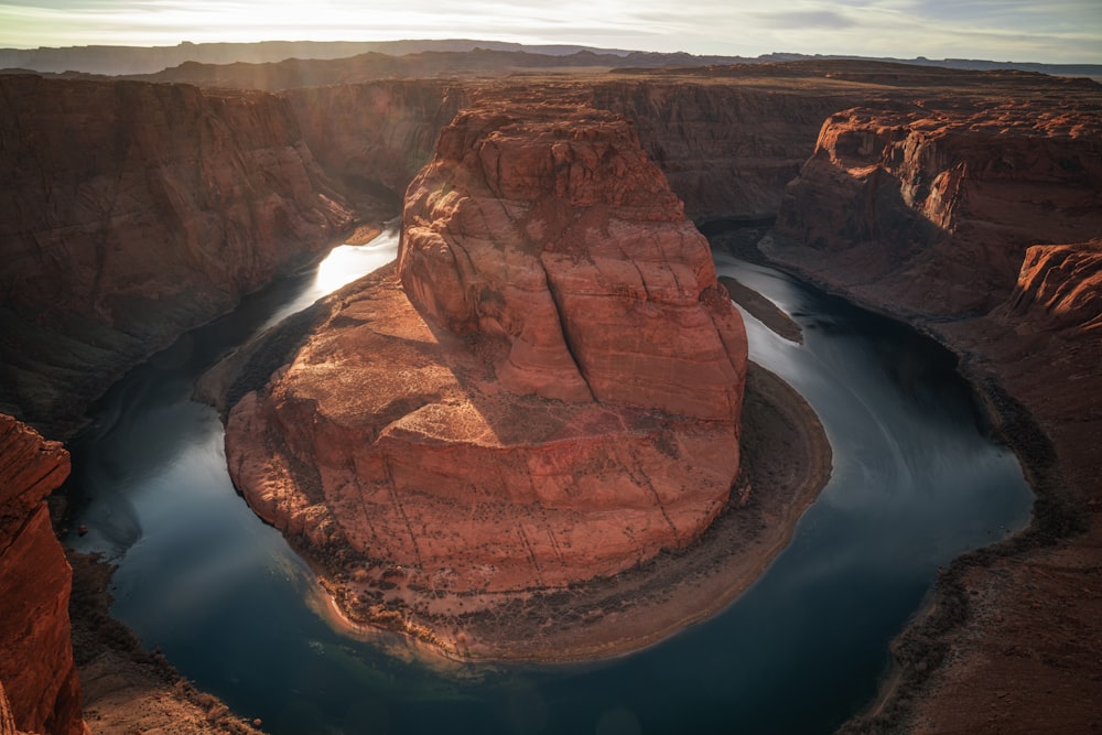 a large canyon with a river running through it