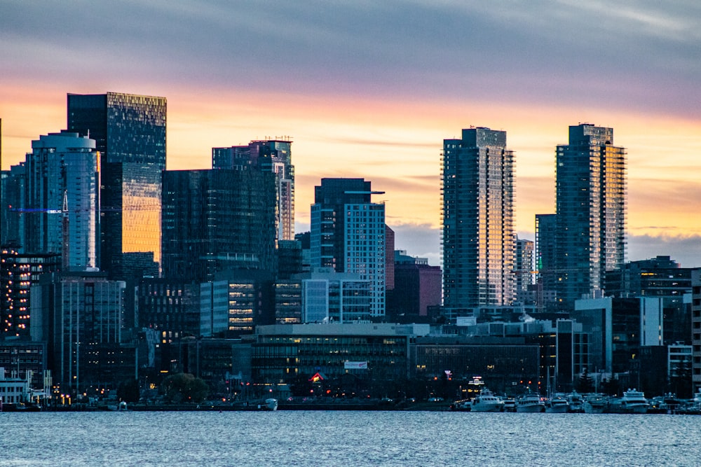 a view of a city skyline at sunset