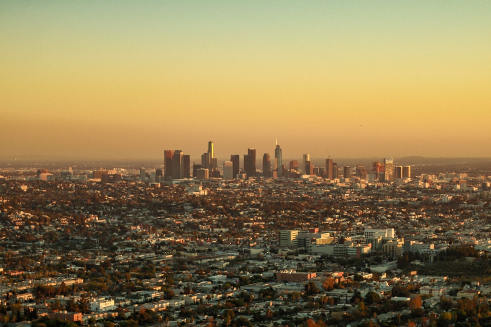 a view of a city from the top of a hill