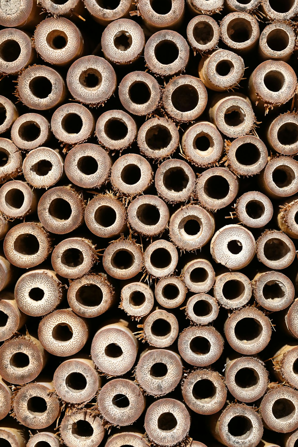 a large pile of old tires stacked on top of each other