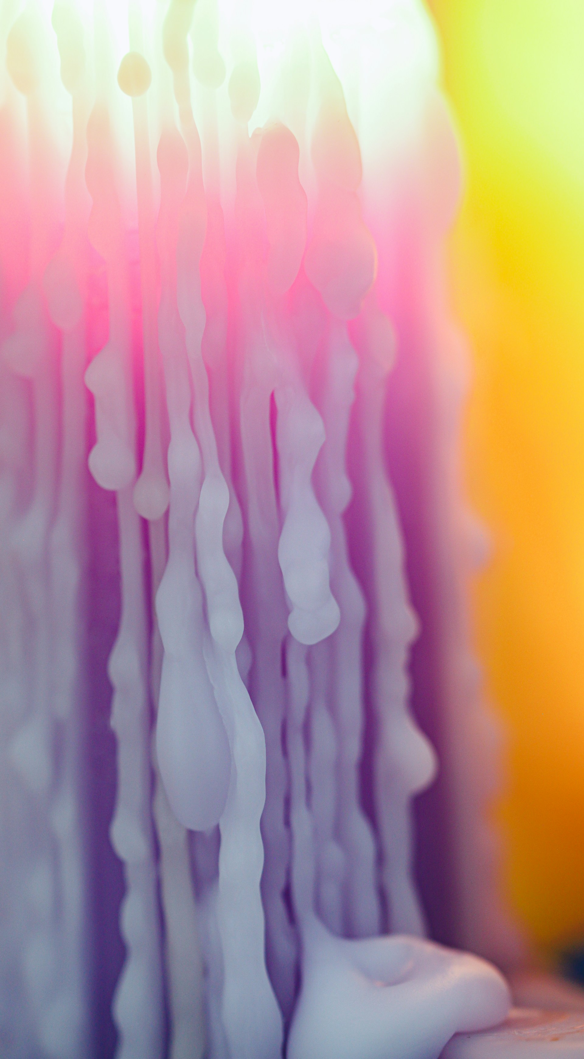 An elegant encaustic piece showcasing flowing wax patterns that mimic the gentle movement of river water.