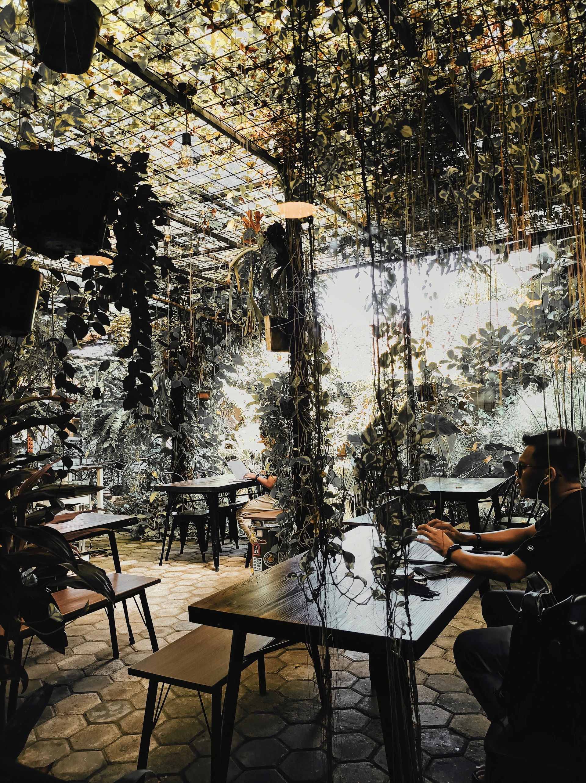 woman wearing yellow long-sleeved dress under white clouds and blue sky during daytime