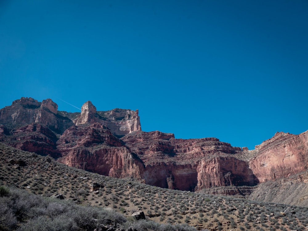 a view of a mountain range with a clear blue sky