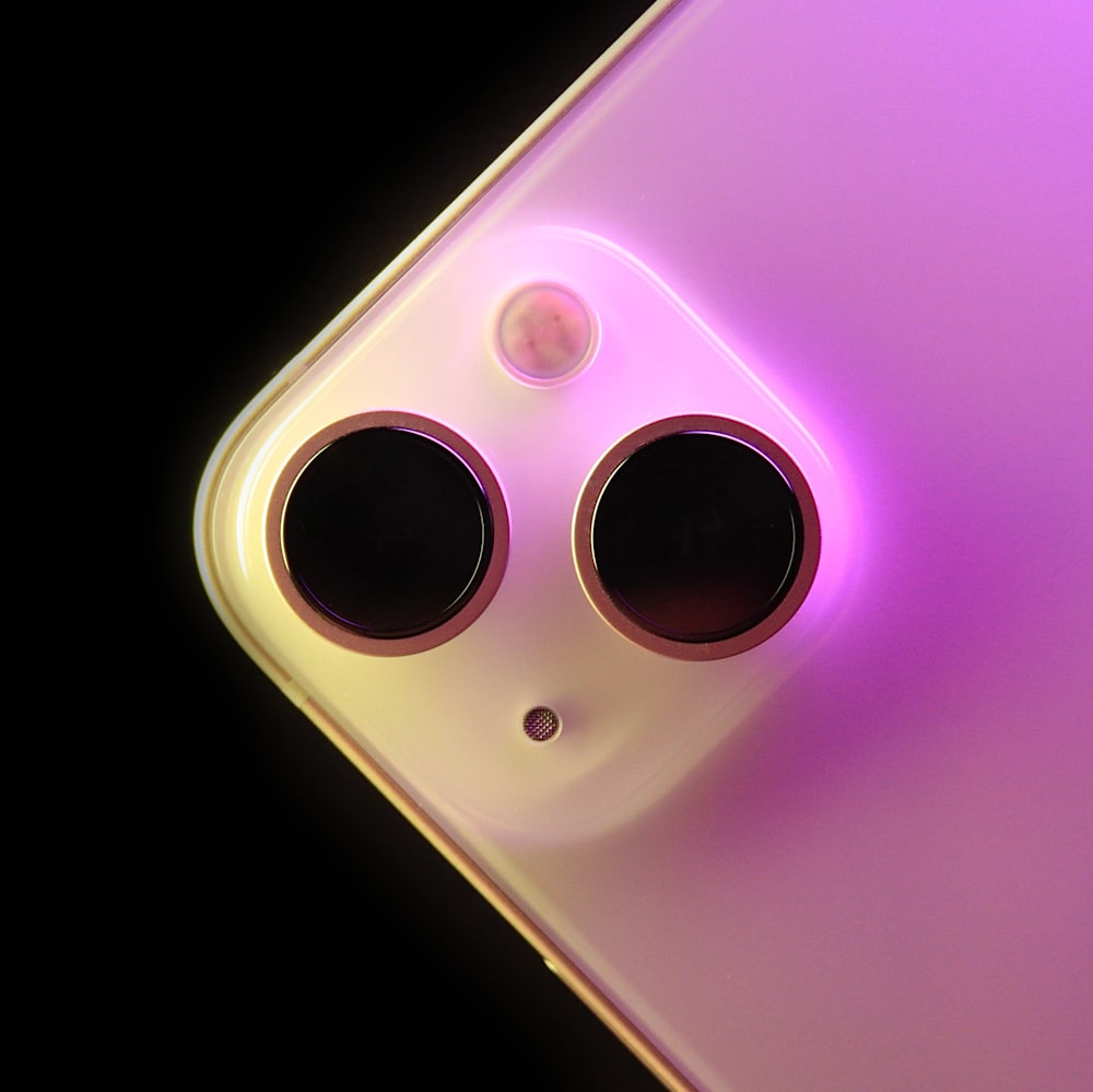 a close up of a cell phone with two speakers