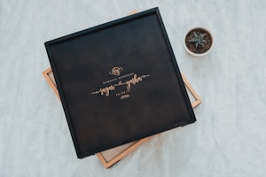 A cozy gift box with personalized wedding keepsakes and handwritten notes.