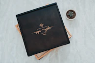 Guests writing warm wishes in the lilas amour wedding guestbook.