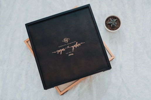 A beautifully designed audio guest book setup at a wedding.