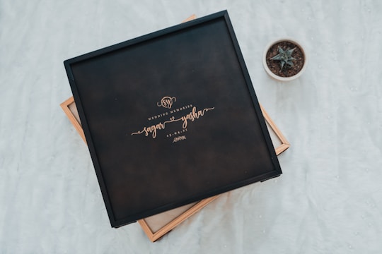 A beautifully designed audio and video guest book setup at a wedding.