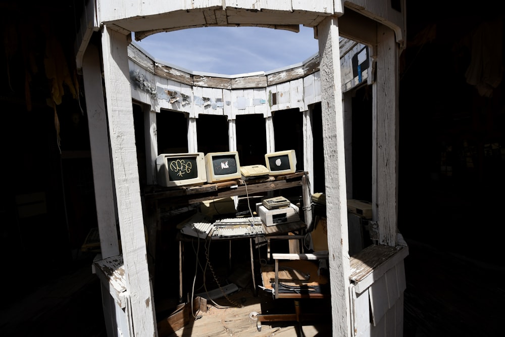 a room that has a bunch of old computers in it