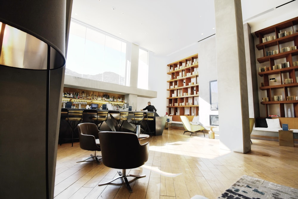 a room with a lot of books on the shelves