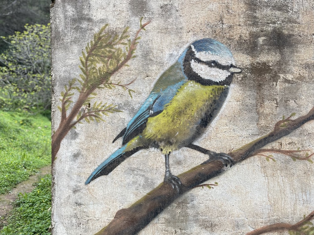 uma pintura de um pássaro em um galho de árvore