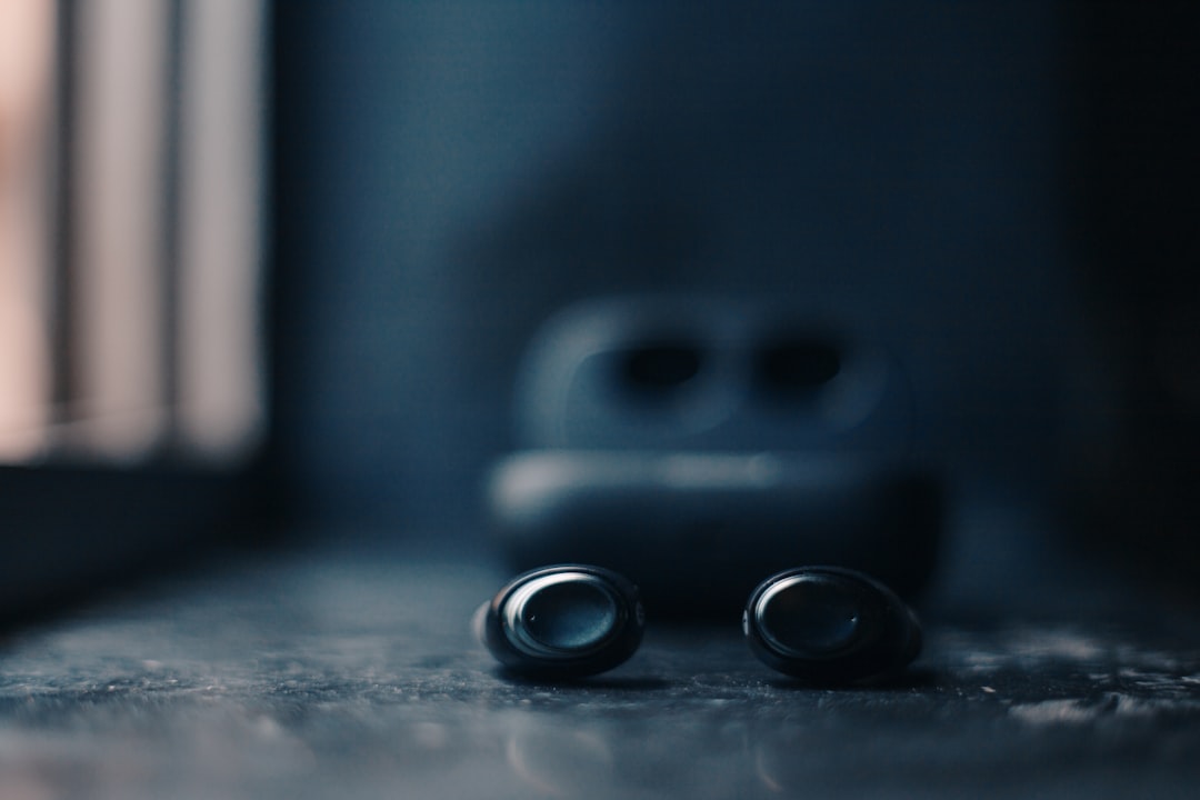 a pair of ear buds sitting on top of a table, Earbuds by Loopaudio.<p></figure>Model: TrueLoop 