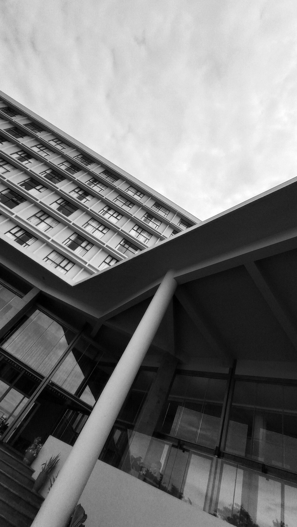 a black and white photo of a tall building