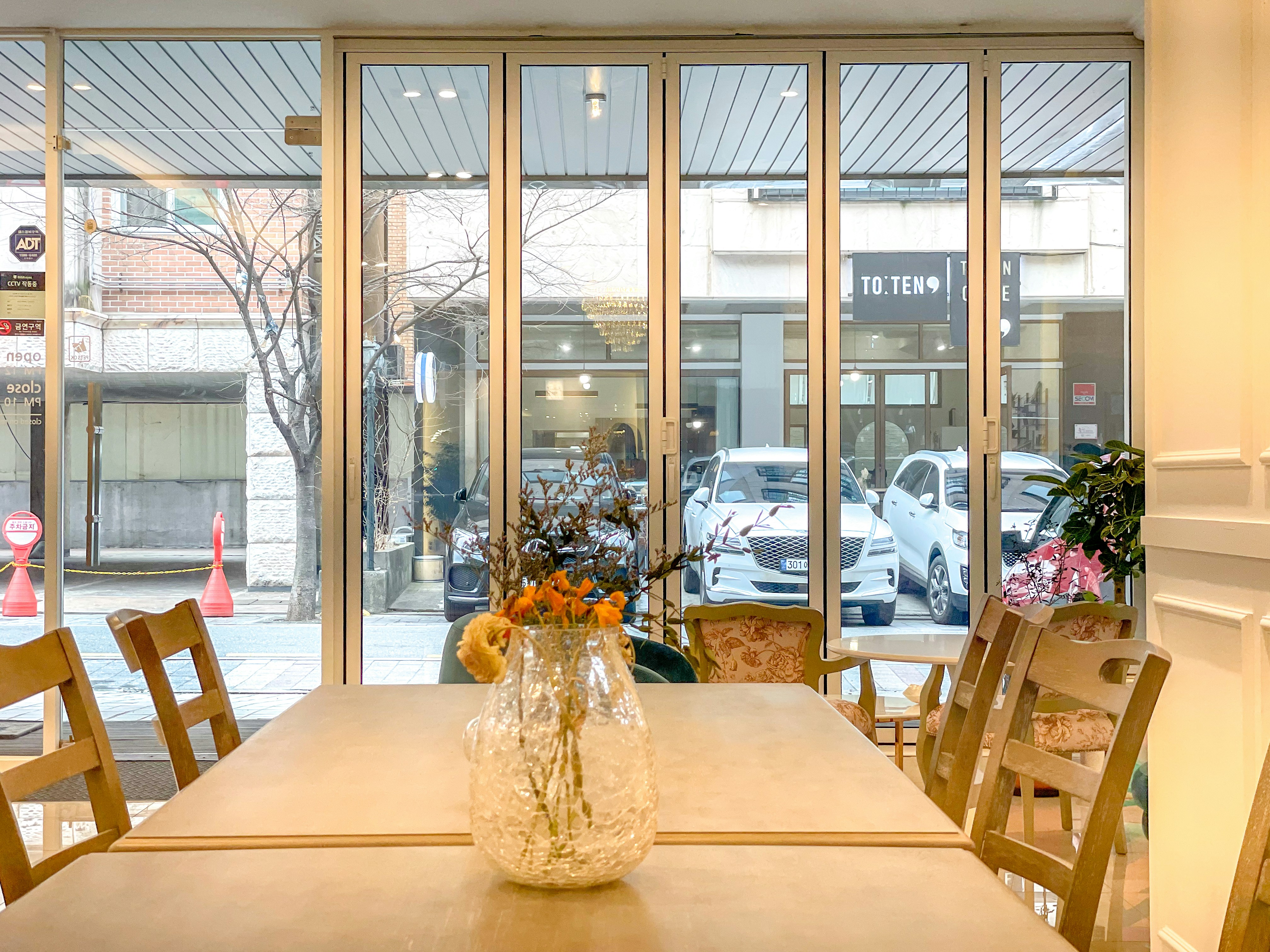 a vase of flowers sitting on top of a table