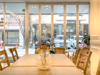 Bright, welcoming interior of Bompani Service Center Al Raqaib with sunlight streaming through the windows.
