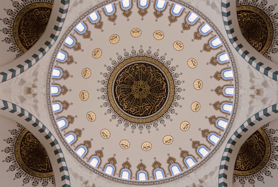 the ceiling of a building with a circular design