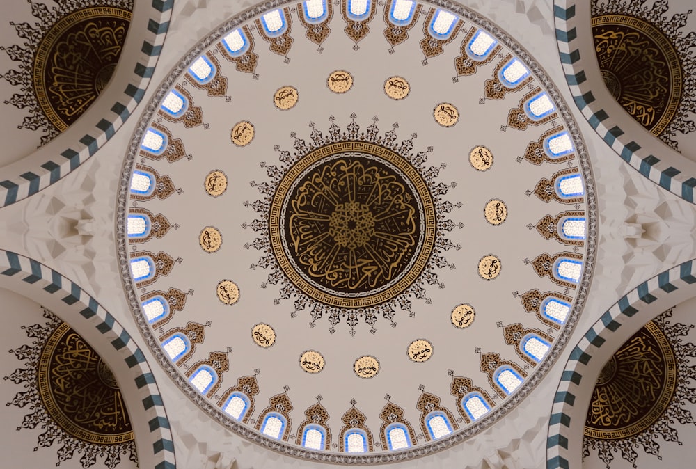 the ceiling of a building with a circular design