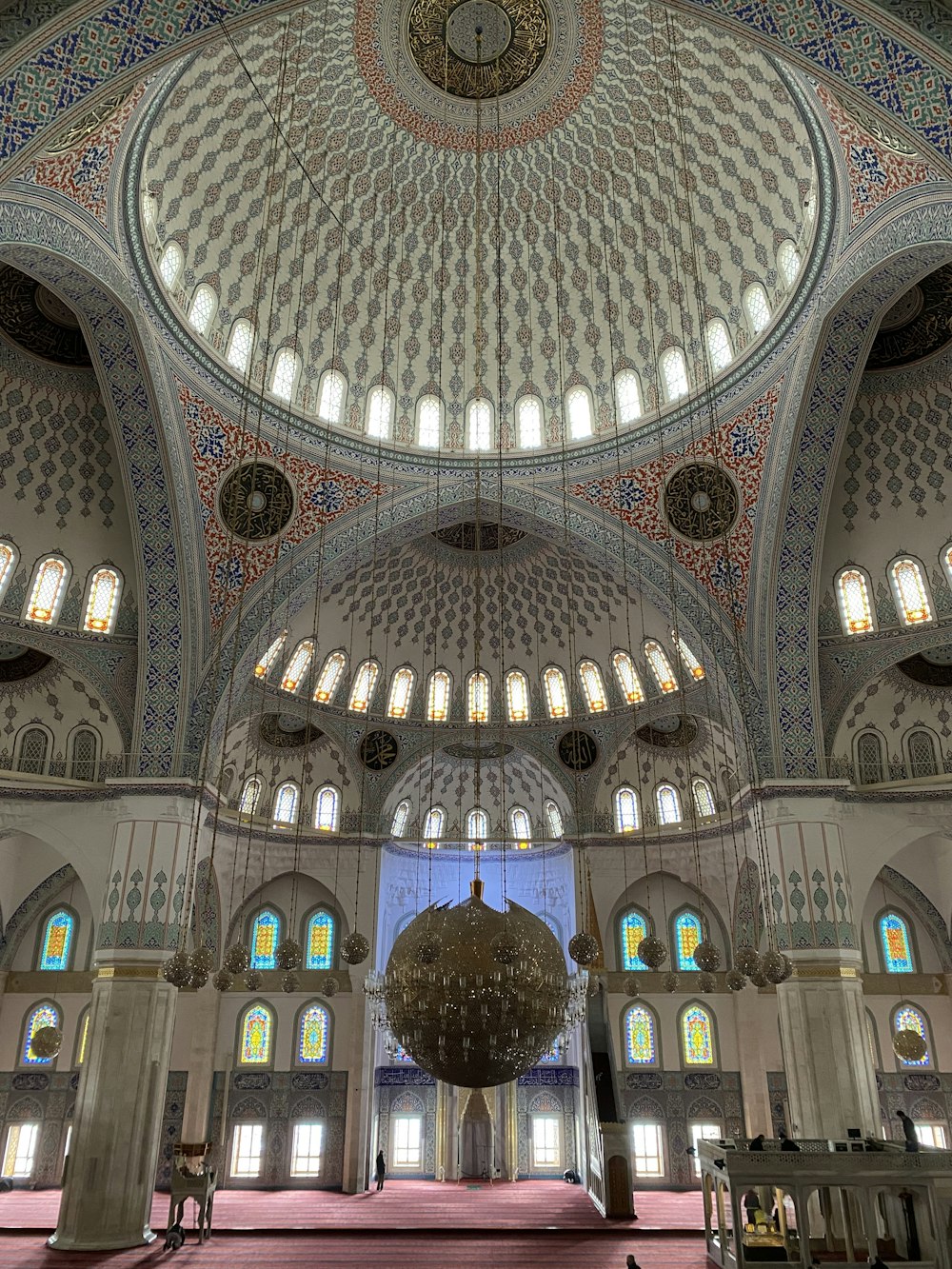 the inside of a large building with a dome ceiling