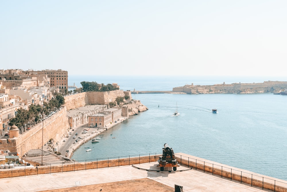 a large body of water next to a city