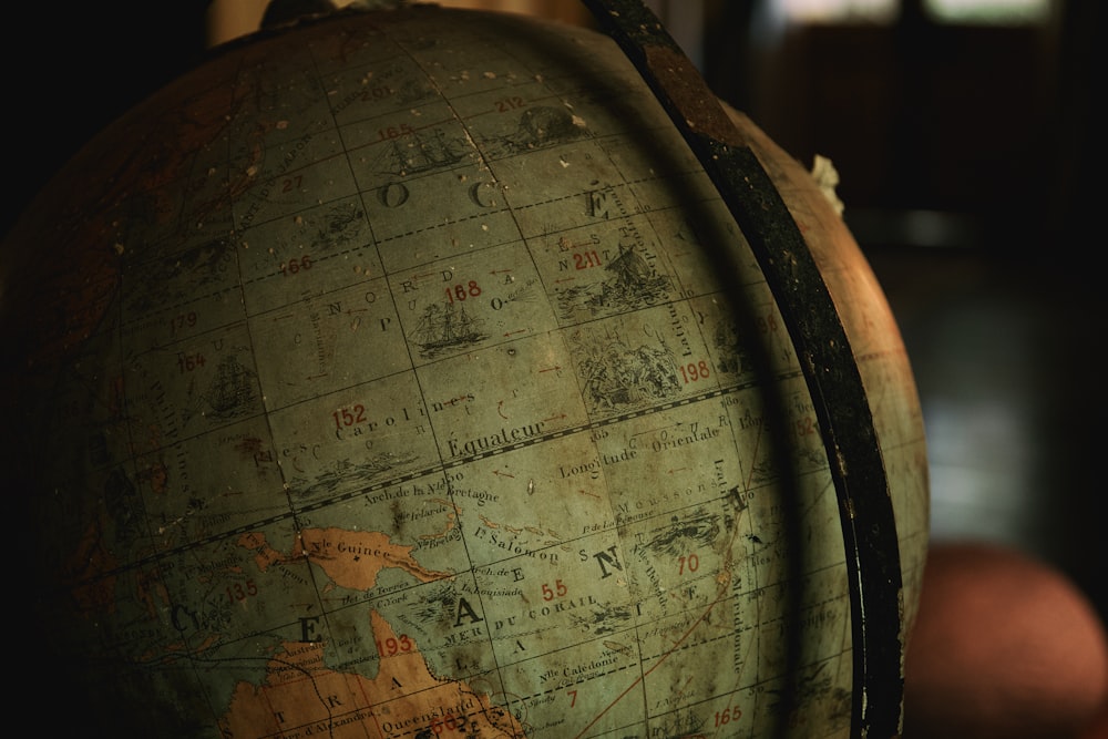 a close up of a globe on a table